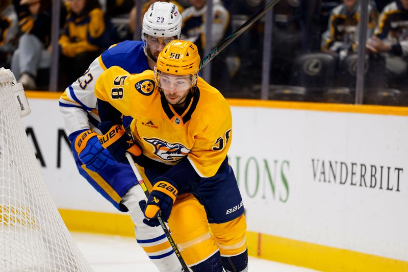 Jan 20, 2026; Nashville, Tennessee, USA;  Nashville Predators left wing Michael Bunting (58) skates behind the net against the Buffalo Sabres during the first period at Bridgestone Arena. Mandatory Credit: Steve Roberts-Imagn Images