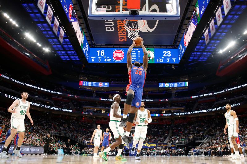 DETROIT, MI - OCTOBER 26:  Isaiah Stewart #28 of the Detroit Pistons dunks the ball during the game against the Boston Celtics during a regular season game on October 26, 2024 at Little Caesars Arena in Detroit, Michigan. NOTE TO USER: User expressly acknowledges and agrees that, by downloading and/or using this photograph, User is consenting to the terms and conditions of the Getty Images License Agreement. Mandatory Copyright Notice: Copyright 2024 NBAE (Photo by Brian Sevald/NBAE via Getty Images)