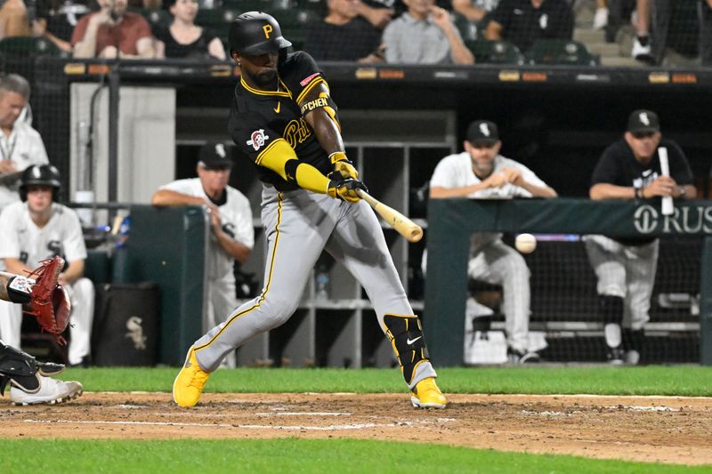 Jul 12, 2024; Chicago, Illinois, USA;  Pittsburgh Pirates outfielder Andrew McCutchen (22) doubles against the Chicago White Sox during the eighth inning at Guaranteed Rate Field. Mandatory Credit: Matt Marton-USA TODAY Sports