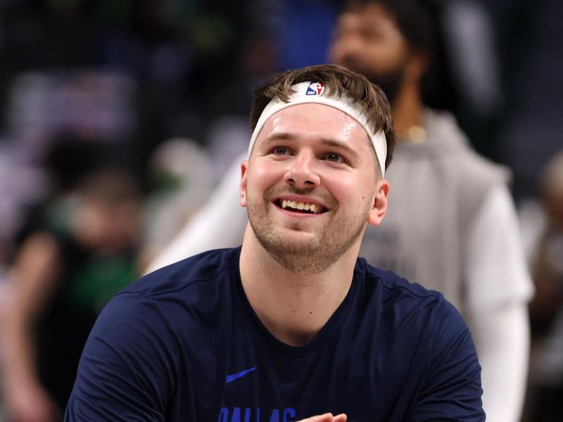 DALLAS, TEXAS - JANUARY 22: Luka Doncic #77 of the Dallas Mavericks shoots a free throw before the game against the Boston Celtics at American Airlines Center on January 22, 2024 in Dallas, Texas. NOTE TO USER: User expressly acknowledges and agrees that, by downloading and or using this photograph, User is consenting to the terms and conditions of the Getty Images License Agreement. (Photo by Tim Heitman/Getty Images)