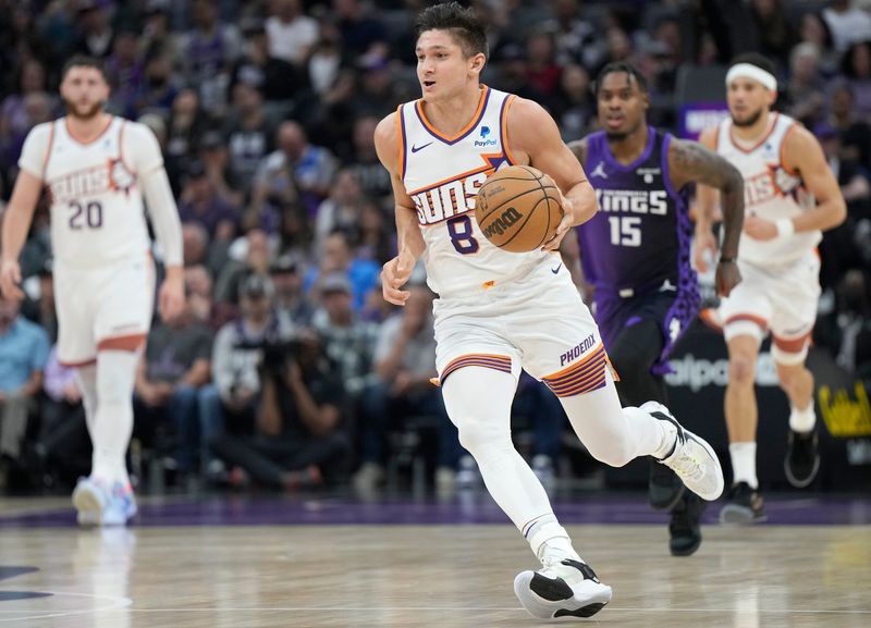 SACRAMENTO, CALIFORNIA - APRIL 12: Grayson Allen #8 of the Phoenix Suns dribbles the ball up court against the Sacramento Kings during the first half of an NBA basketball game at Golden 1 Center on April 12, 2024 in Sacramento, California. NOTE TO USER: User expressly acknowledges and agrees that, by downloading and or using this photograph, User is consenting to the terms and conditions of the Getty Images License Agreement. (Photo by Thearon W. Henderson/Getty Images)