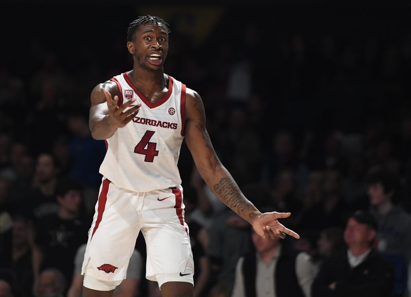 Jan 14, 2023; Nashville, Tennessee, USA; Arkansas Razorbacks guard Davonte Davis (4) reacts after being called for a foul during the second half against the Vanderbilt Commodores at Memorial Gymnasium. Mandatory Credit: Christopher Hanewinckel-USA TODAY Sports