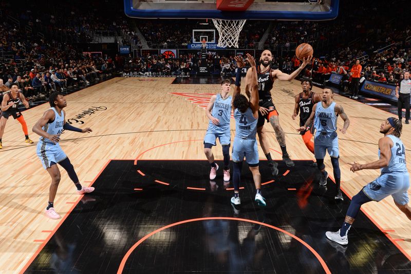 DETROIT, MI - APRIL 1: Evan Fournier #31 of the Detroit Pistons  shoots the ball during the game against the Memphis Grizzlies on April 1, 2024 at Little Caesars Arena in Detroit, Michigan. NOTE TO USER: User expressly acknowledges and agrees that, by downloading and/or using this photograph, User is consenting to the terms and conditions of the Getty Images License Agreement. Mandatory Copyright Notice: Copyright 2024 NBAE (Photo by Chris Schwegler/NBAE via Getty Images)