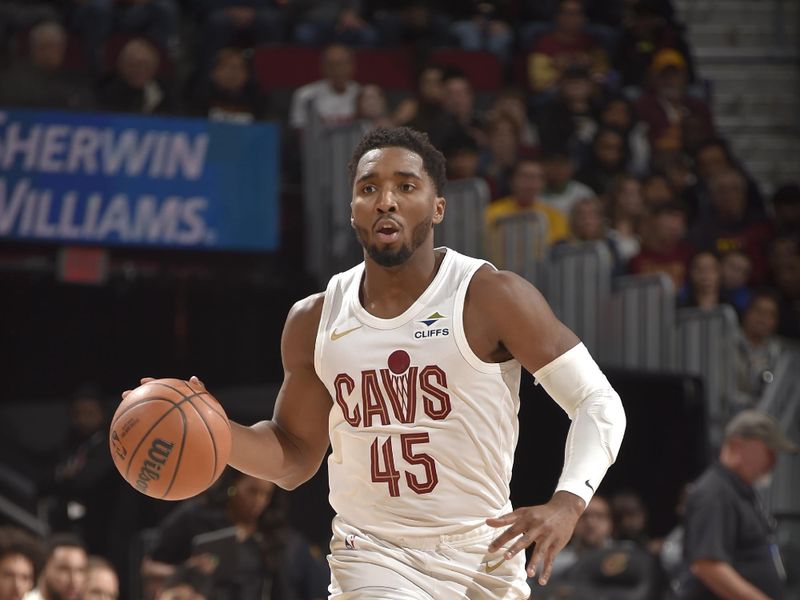 CLEVELAND, OH - NOVEMBER 9: Donovan Mitchell #45 of the Cleveland Cavaliers brings the ball up court during the game against the Brooklyn Nets on November 9, 2024 at Rocket Mortgage FieldHouse in Cleveland, Ohio. NOTE TO USER: User expressly acknowledges and agrees that, by downloading and/or using this Photograph, user is consenting to the terms and conditions of the Getty Images License Agreement. Mandatory Copyright Notice: Copyright 2024 NBAE (Photo by David Liam Kyle/NBAE via Getty Images)