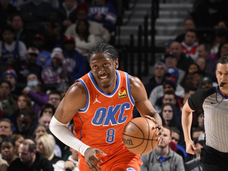 PHILADELPHIA, PA - JANUARY 14: Jalen Williams #8 of the Oklahoma City Thunder dribbles the ball during the game against the Philadelphia 76ers on January 14, 2025 at the Wells Fargo Center in Philadelphia, Pennsylvania NOTE TO USER: User expressly acknowledges and agrees that, by downloading and/or using this Photograph, user is consenting to the terms and conditions of the Getty Images License Agreement. Mandatory Copyright Notice: Copyright 2025 NBAE (Photo by David Dow/NBAE via Getty Images)