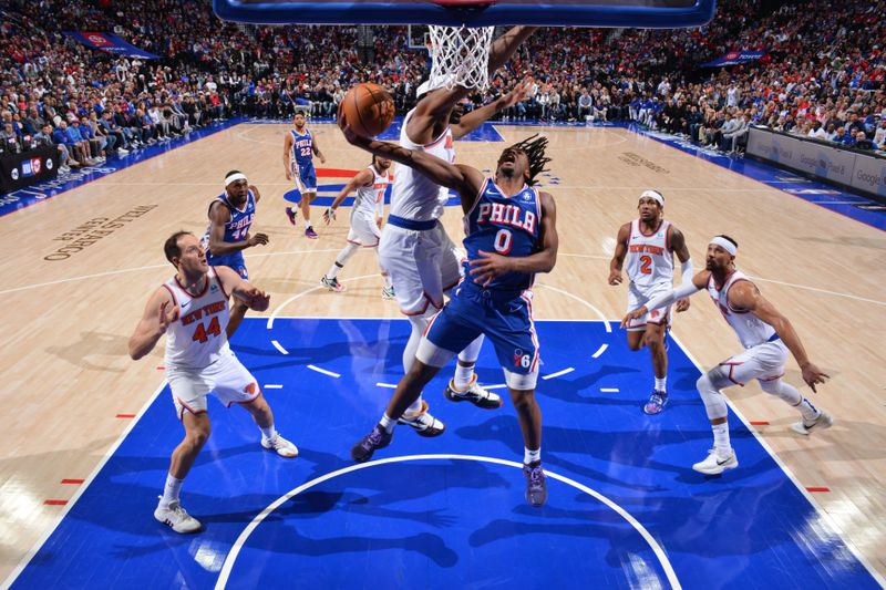 PHILADELPHIA, PA - APRIL 25: Tyrese Maxey #0 of the Philadelphia 76ers shoots the ball during the game against the New York Knicks during Round 1 Game 3 of the 2024 NBA Playoffs on April 25, 2024 at the Wells Fargo Center in Philadelphia, Pennsylvania NOTE TO USER: User expressly acknowledges and agrees that, by downloading and/or using this Photograph, user is consenting to the terms and conditions of the Getty Images License Agreement. Mandatory Copyright Notice: Copyright 2024 NBAE (Photo by Jesse D. Garrabrant/NBAE via Getty Images)