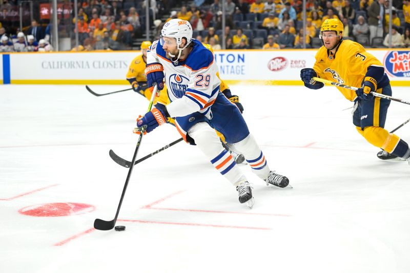 Oct 17, 2024; Nashville, Tennessee, USA;  Edmonton Oilers center Leon Draisaitl (29) skates with the puck against the Nashville Predators during the second period at Bridgestone Arena. Mandatory Credit: Steve Roberts-Imagn Images