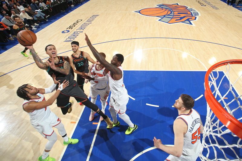 NEW YORK, NY - JANUARY 18: Kyle Kuzma #33 of the Washington Wizards drives to the basket during the game against the New York Knicks on January 18, 2024 at Madison Square Garden in New York City, New York. NOTE TO USER: User expressly acknowledges and agrees that, by downloading and or using this photograph, User is consenting to the terms and conditions of the Getty Images License Agreement. Mandatory Copyright Notice: Copyright 2024 NBAE  (Photo by Nathaniel S. Butler/NBAE via Getty Images)