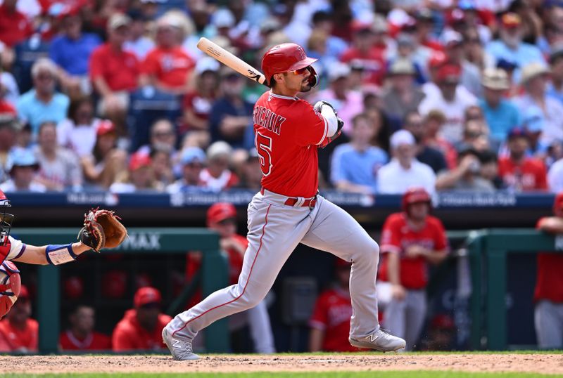 Aug 30, 2023; Philadelphia, Pennsylvania, USA; Los Angeles Angels outfielder Randal Grichuk (15) hits a single against the Philadelphia Phillies in the eighth inning at Citizens Bank Park. Mandatory Credit: Kyle Ross-USA TODAY Sports