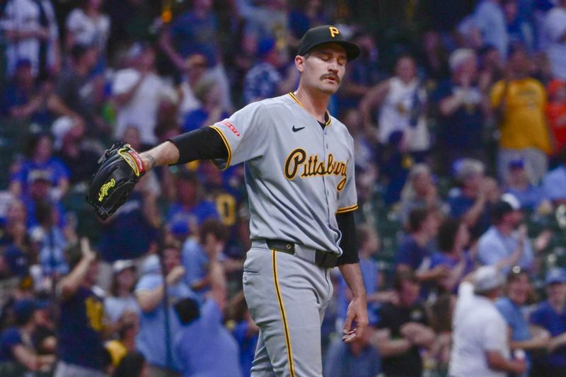 Jun 24, 2025; Milwaukee, Wisconsin, USA;  Pittsburgh Pirates starting pitcher Andrew Heaney (45) reacts after giving up a three-run home run to Milwaukee Brewers third baseman Caleb Durbin (not pictured) in the fourth inning at American Family Field. Mandatory Credit: Benny Sieu-Imagn Images
