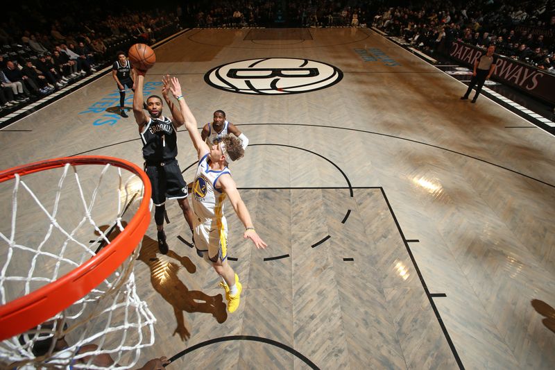 BROOKLYN, NY - FEBRUARY 5: Mikal Bridges #1 of the Brooklyn Nets shoots the ball during the game against the Golden State Warriors on February 5, 2024 at Barclays Center in Brooklyn, New York. NOTE TO USER: User expressly acknowledges and agrees that, by downloading and or using this Photograph, user is consenting to the terms and conditions of the Getty Images License Agreement. Mandatory Copyright Notice: Copyright 2024 NBAE (Photo by Nathaniel S. Butler/NBAE via Getty Images)