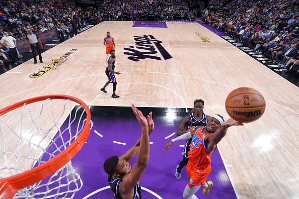 SACRAMENTO, CA - DECEMBER 14: Shai Gilgeous-Alexander #2 of the Oklahoma City Thunder shoots the ball during the game against the Sacramento Kings on December 14, 2023 at Golden 1 Center in Sacramento, California. NOTE TO USER: User expressly acknowledges and agrees that, by downloading and or using this Photograph, user is consenting to the terms and conditions of the Getty Images License Agreement. Mandatory Copyright Notice: Copyright 2023 NBAE (Photo by Rocky Widner/NBAE via Getty Images)