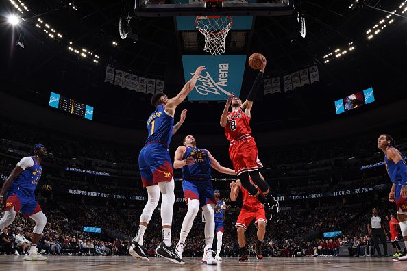 DENVER, CO - NOVEMBER 4: Zach LaVine #8 of the Chicago Bulls drives to the basket during the game against the Denver Nuggets on November 4, 2023 at the Ball Arena in Denver, Colorado. NOTE TO USER: User expressly acknowledges and agrees that, by downloading and/or using this Photograph, user is consenting to the terms and conditions of the Getty Images License Agreement. Mandatory Copyright Notice: Copyright 2023 NBAE (Photo by Garrett Ellwood/NBAE via Getty Images)