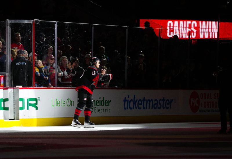 Mar 10, 2024; Raleigh, North Carolina, USA;  Carolina Hurricanes center Sebastian Aho (20) comes out onto the ice after the win against the Calgary Flames at PNC Arena. Mandatory Credit: James Guillory-USA TODAY Sports