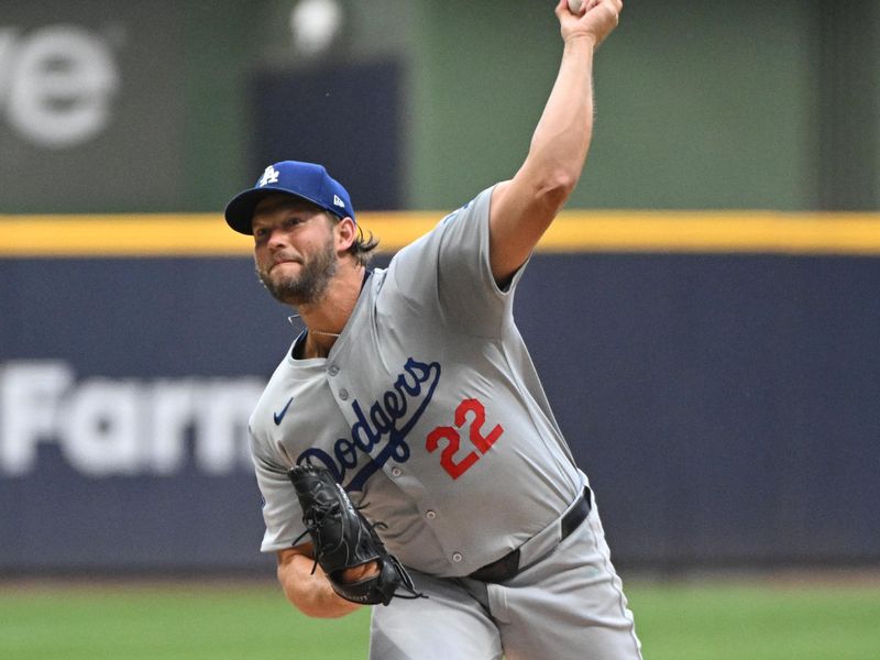 Aug 12, 2024; Milwaukee, Wisconsin, USA; Los Angeles Dodgers pitcher Clayton Kershaw (22) delivers a pitch against the Milwaukee Brewers in the first inningt at American Family Field. Mandatory Credit: Michael McLoone-USA TODAY Sports