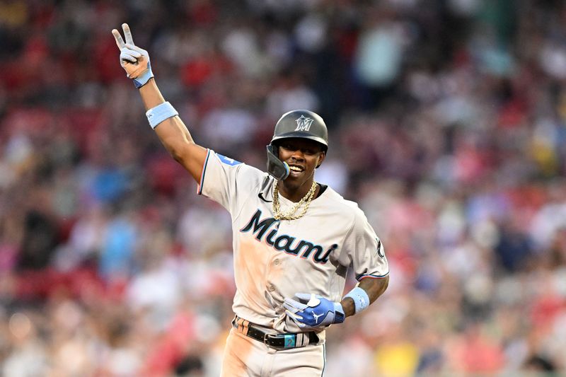 Jun 29, 2023; Boston, Massachusetts, USA; Miami Marlins center fielder Jazz Chisholm Jr. (2) reacts after hitting a home run against the Boston Red Sox during the ninth inning at Fenway Park. Mandatory Credit: Brian Fluharty-USA TODAY Sports