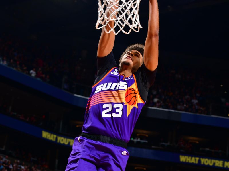 PHOENIX, AZ - OCTOBER 28: Cameron Johnson #23 of the Phoenix Suns dunks the ball during the game against the New Orleans Pelicans on October 28, 2022 at Footprint Center in Phoenix, Arizona. NOTE TO USER: User expressly acknowledges and agrees that, by downloading and or using this photograph, user is consenting to the terms and conditions of the Getty Images License Agreement. Mandatory Copyright Notice: Copyright 2022 NBAE (Photo by Barry Gossage/NBAE via Getty Images)