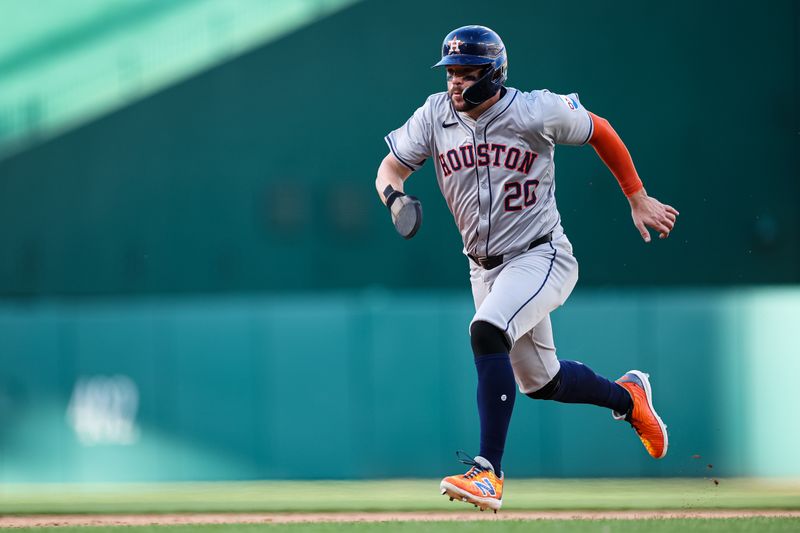 Apr 20, 2024; Washington, District of Columbia, USA; Houston Astros outfielder Chas McCormick (20) steals third base against the Washington Nationals during the ninth inning at Nationals Park. Mandatory Credit: Scott Taetsch-USA TODAY Sports