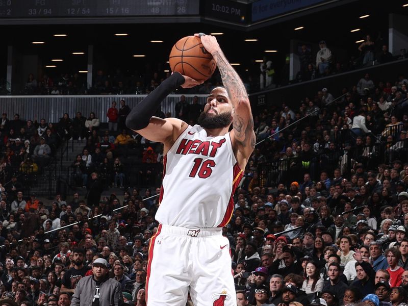 BROOKLYN, NY - JANUARY 15: Caleb Martin #16 of the Miami Heat shoots the ball during the game against the Brooklyn Nets on January 15, 2024 at Barclays Center in Brooklyn, New York. NOTE TO USER: User expressly acknowledges and agrees that, by downloading and or using this Photograph, user is consenting to the terms and conditions of the Getty Images License Agreement. Mandatory Copyright Notice: Copyright 2024 NBAE (Photo by Nathaniel S. Butler/NBAE via Getty Images)