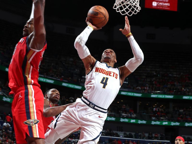 NEW ORLEANS, LA - NOVEMBER 15: Russell Westbrook #4 of the Denver Nuggets drives to the basket during the game against the New Orleans Pelicans during the Emirates NBA Cup game on November 15, 2024 at the Smoothie King Center in New Orleans, Louisiana. NOTE TO USER: User expressly acknowledges and agrees that, by downloading and or using this Photograph, user is consenting to the terms and conditions of the Getty Images License Agreement. Mandatory Copyright Notice: Copyright 2024 NBAE (Photo by Layne Murdoch Jr./NBAE via Getty Images)