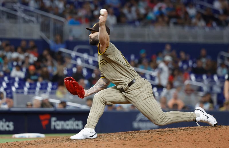 Aug 9, 2024; Miami, Florida, USA;  San Diego Padres relief pitcher Tanner Scott (66) pitches in the tenth inning at loanDepot Park. Mandatory Credit: Rhona Wise-USA TODAY Sports