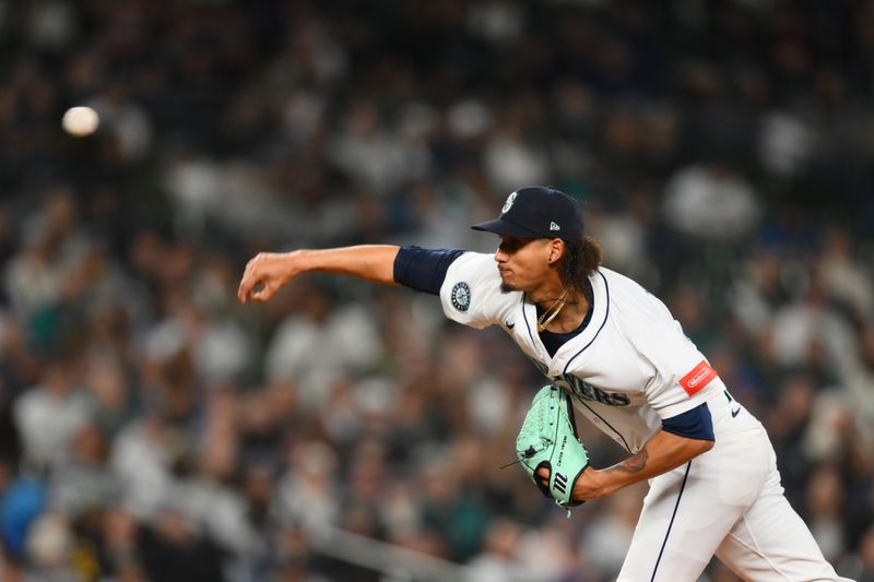 May 13, 2025; Seattle, Washington, USA; Seattle Mariners relief pitcher Carlos Vargas (54) pitches to the New York Yankees during the tenth inning at T-Mobile Park. Mandatory Credit: Steven Bisig-Imagn Images