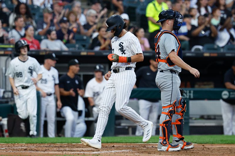 Aug 24, 2024; Chicago, Illinois, USA; Chicago White Sox second baseman Brooks Baldwin (27) scores against the Detroit Tigers during the third inning at Guaranteed Rate Field. Mandatory Credit: Kamil Krzaczynski-USA TODAY Sports