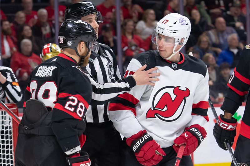 Apr 6, 2024; Ottawa, Ontario, CAN; Ottawa Senators right wing Claude Giroux (28) exchanges words with New Jersey Devils defenseman Simon Nemec (17) in the second period at the Canadian Tire Centre. Mandatory Credit: Marc DesRosiers-USA TODAY Sports