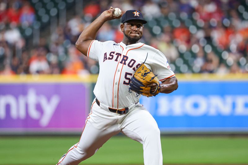 Jun 5, 2024; Houston, Texas, USA; Houston Astros starting pitcher Ronel Blanco (56) delivers a pitch during the second inning against the St. Louis Cardinals at Minute Maid Park. Mandatory Credit: Troy Taormina-USA TODAY Sports