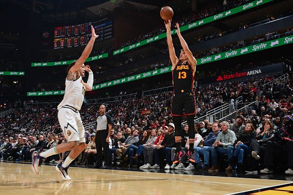 ATLANTA, GA - DECEMBER 11: Bogdan Bogdanovic #13 of the Atlanta Hawks shoots the ball during the game against the Denver Nuggets on December 11, 2023 at State Farm Arena in Atlanta, Georgia.  NOTE TO USER: User expressly acknowledges and agrees that, by downloading and/or using this Photograph, user is consenting to the terms and conditions of the Getty Images License Agreement. Mandatory Copyright Notice: Copyright 2023 NBAE (Photo by Scott Cunningham/NBAE via Getty Images)