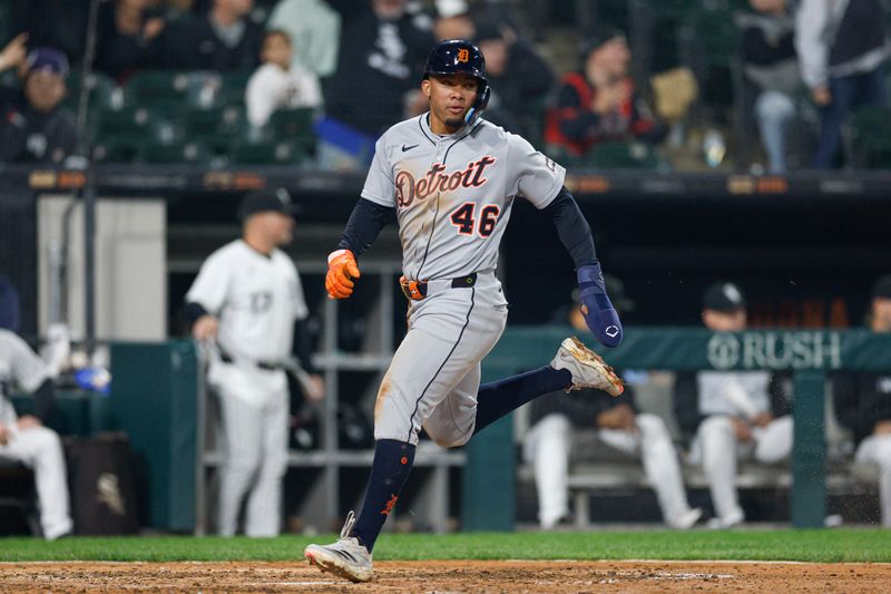 Jun 4, 2025; Chicago, Illinois, USA; Detroit Tigers right fielder Wenceel Perez (46) scores against the Chicago White Sox during the eight inning at Rate Field. Mandatory Credit: Kamil Krzaczynski-Imagn Images