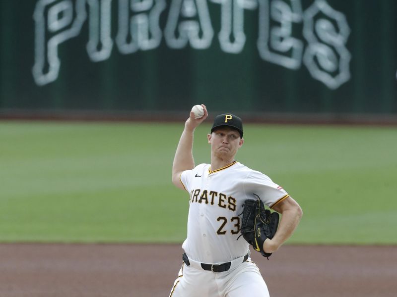 Sep 26, 2024; Pittsburgh, Pennsylvania, USA; Pittsburgh Pirates starting pitcher Mitch Keller (23) delivers a pitch  against the Milwaukee Brewers during the first inning at PNC Park. Mandatory Credit: Charles LeClaire-Imagn Images