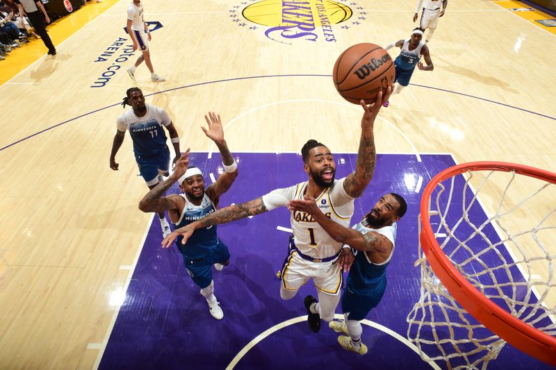 LOS ANGELES, CA - MARCH 10: D'Angelo Russell #1 of the Los Angeles Lakers drives to the basket during the game against the Minnesota Timberwolves on March 10, 2024 at Crypto.Com Arena in Los Angeles, California. NOTE TO USER: User expressly acknowledges and agrees that, by downloading and/or using this Photograph, user is consenting to the terms and conditions of the Getty Images License Agreement. Mandatory Copyright Notice: Copyright 2024 NBAE (Photo by Adam Pantozzi/NBAE via Getty Images)