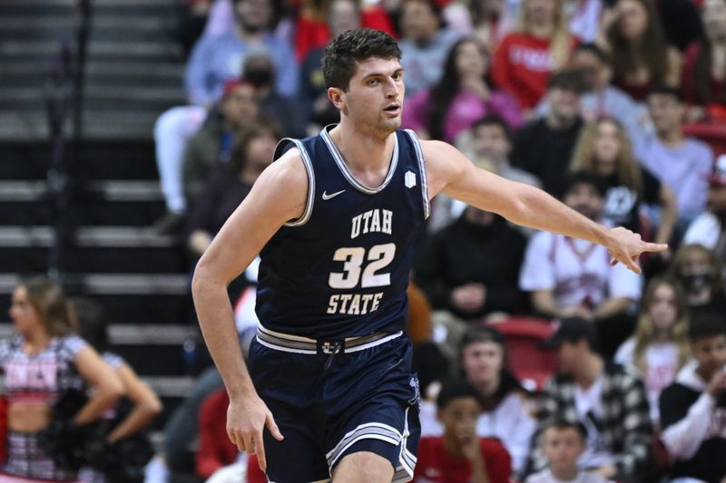 Mar 1, 2023; Las Vegas, Nevada, USA; Utah State Aggies center Trevin Dorius (32) celebrates a basket against the UNLV Rebels in the first half at Thomas & Mack Center. Mandatory Credit: Candice Ward-USA TODAY Sports