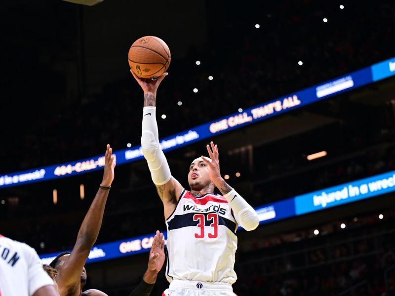 ATLANTA, GA - NOVEMBER 15:   Kyle Kuzma #33 of the Washington Wizards shoots the ball during the game against the Atlanta Hawks during the Emirates NBA Cup game on November 15, 2024 at State Farm Arena in Atlanta, Georgia.  NOTE TO USER: User expressly acknowledges and agrees that, by downloading and/or using this Photograph, user is consenting to the terms and conditions of the Getty Images License Agreement. Mandatory Copyright Notice: Copyright 2024 NBAE (Photo by Adam Hagy/NBAE via Getty Images)