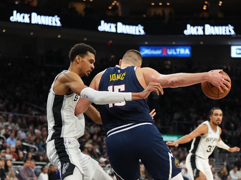 AUSTIN, TX - MARCH 15: Nikola Jokic #15 of the Denver Nuggets drives to the basket during the game against the San Antonio Spurs on March 15, 2024 at the Moody Center in Austin, Texas. NOTE TO USER: User expressly acknowledges and agrees that, by downloading and/or using this Photograph, user is consenting to the terms and conditions of the Getty Images License Agreement. Mandatory Copyright Notice: Copyright 2024 NBAE (Photo by Garrett Ellwood/NBAE via Getty Images)