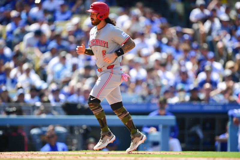 May 19, 2024; Los Angeles, California, USA; Cincinnati Reds second base Jonathan India (6) scores a run on bases loaded walk against the Los Angeles Dodgers during the seventh inning at Dodger Stadium. Mandatory Credit: Gary A. Vasquez-USA TODAY Sports