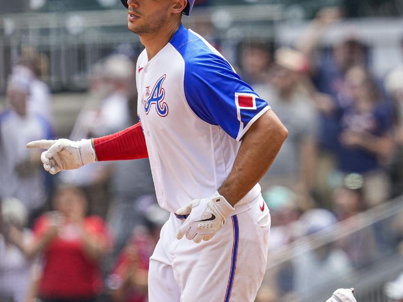 Jul 30, 2023; Cumberland, Georgia, USA; Atlanta Braves first baseman Matt Olson (28) reacts as he runs after hitting a two run home run against the Milwaukee Brewers during the eighth inning at Truist Park. Mandatory Credit: Dale Zanine-USA TODAY Sports