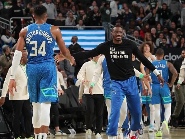 MILWAUKEE, WI - NOVEMBER 24: Giannis Antetokounmpo #34 high fives Thanasis Antetokounmpo #43 of the Milwaukee Bucks during the game against the Washington Wizards during the In-Season Tournament on November 24, 2023 at the Fiserv Forum Center in Milwaukee, Wisconsin. NOTE TO USER: User expressly acknowledges and agrees that, by downloading and or using this Photograph, user is consenting to the terms and conditions of the Getty Images License Agreement. Mandatory Copyright Notice: Copyright 2023 NBAE (Photo by Gary Dineen/NBAE via Getty Images).