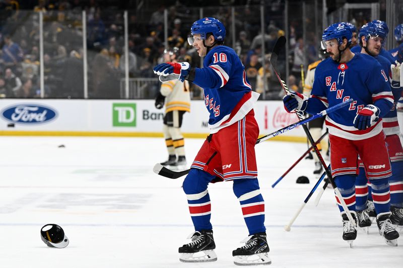 Mar 21, 2024; Boston, Massachusetts, USA; New York Rangers left wing Artemi Panarin (10) celebrates with his teammates after scoring a goal against the Boston Bruins during the third period at the TD Garden. Mandatory Credit: Brian Fluharty-USA TODAY Sports