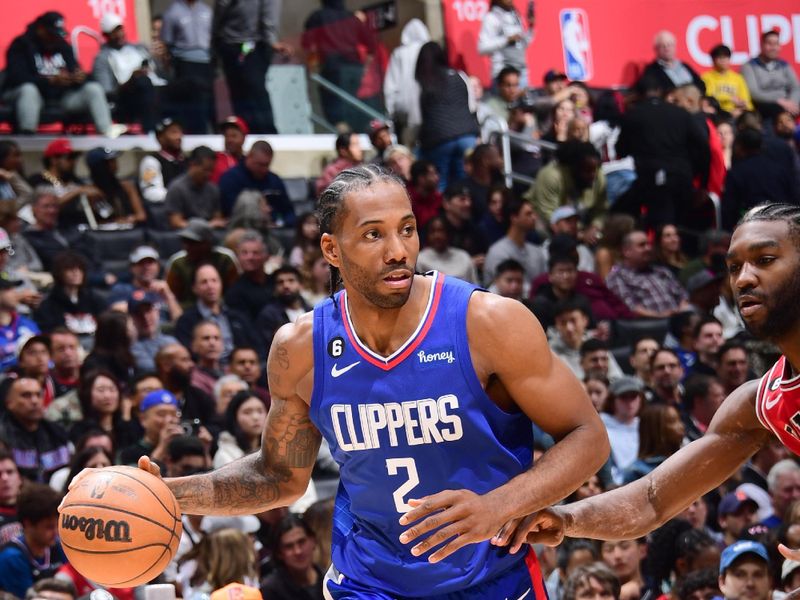 LOS ANGELES, CA - MARCH 27: Kawhi Leonard #2 of the LA Clippers moves the ball during the game against the Chicago Bulls on March 27, 2023 at Crypto.Com Arena in Los Angeles, California. NOTE TO USER: User expressly acknowledges and agrees that, by downloading and/or using this Photograph, user is consenting to the terms and conditions of the Getty Images License Agreement. Mandatory Copyright Notice: Copyright 2023 NBAE (Photo by Adam Pantozzi/NBAE via Getty Images)