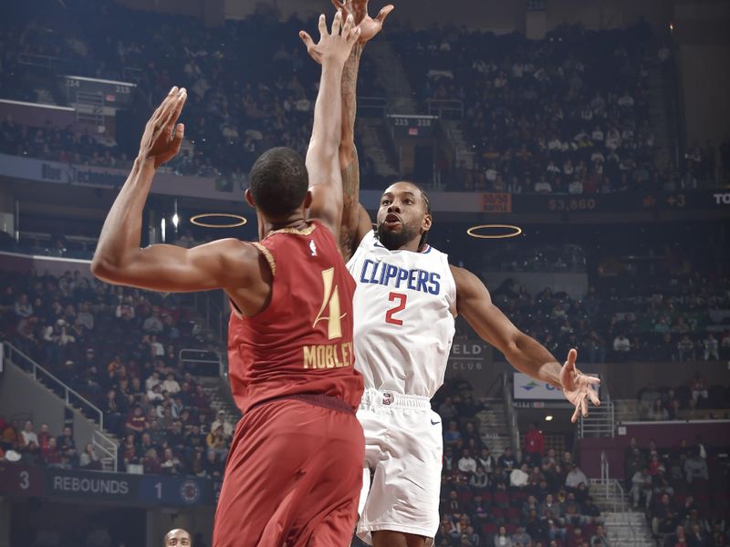 CLEVELAND, OH - JANUARY 29: Kawhi Leonard #2 of the LA Clippers shoots the ball during the game against the Cleveland Cavaliers on January 29, 2024 at Rocket Mortgage FieldHouse in Cleveland, Ohio. NOTE TO USER: User expressly acknowledges and agrees that, by downloading and/or using this Photograph, user is consenting to the terms and conditions of the Getty Images License Agreement. Mandatory Copyright Notice: Copyright 2024 NBAE (Photo by David Liam Kyle/NBAE via Getty Images)