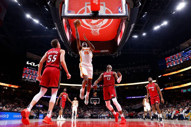 ATLANTA, GEORGIA - FEBRUARY 24: Clint Capela #15 of the Atlanta Hawks goes up for a shot against the Miami Heat during the first half at State Farm Arena on February 24, 2025 in Atlanta, Georgia. NOTE TO USER: User expressly acknowledges and agrees that, by downloading and or using this photograph, User is consenting to the terms and conditions of the Getty Images License Agreement. (Photo by Todd Kirkland/Getty Images)