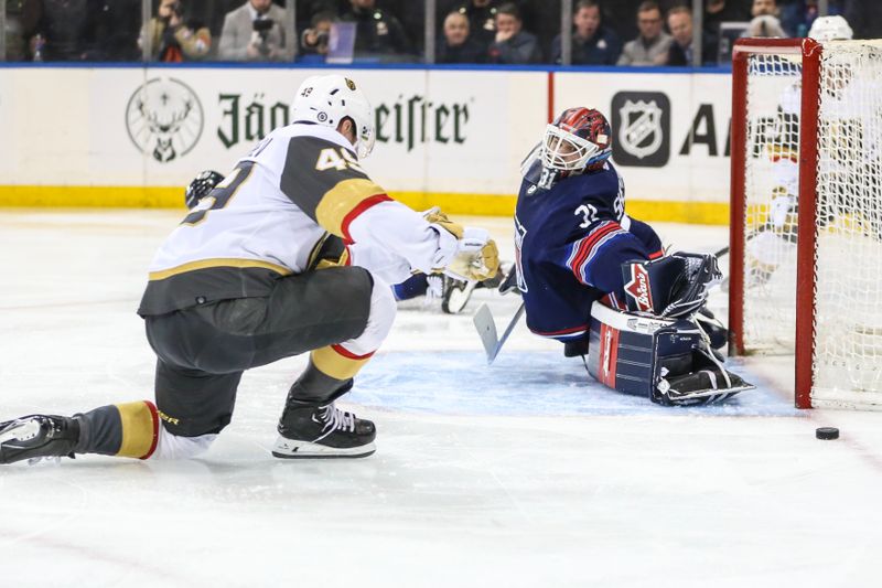 Jan 26, 2024; New York, New York, USA; New York Rangers goaltender Igor Shesterkin (31) deflects the puck after a shot on goal attempt by Vegas Golden Knights center Ivan Barbashev (49) in the third period at Madison Square Garden. Mandatory Credit: Wendell Cruz-USA TODAY Sports