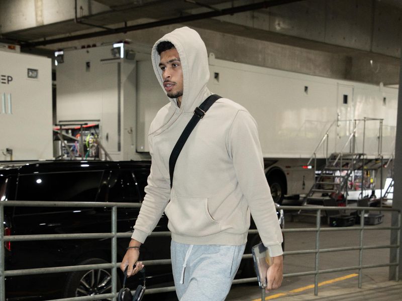 PORTLAND, OR - MARCH 13:  Toumani Camara #33 of the Portland Trail Blazers arrives to the arena before the game on March 13, 2024 at the Moda Center Arena in Portland, Oregon. NOTE TO USER: User expressly acknowledges and agrees that, by downloading and or using this photograph, user is consenting to the terms and conditions of the Getty Images License Agreement. Mandatory Copyright Notice: Copyright 2024 NBAE (Photo by Cameron Browne/NBAE via Getty Images)