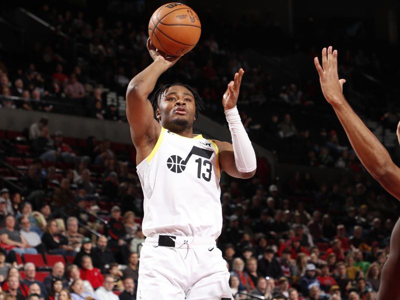 PORTLAND, OR - DECEMBER 6: Isaiah Collier #13 of the Utah Jazz shoots the ball during the game against the Portland Trail Blazers on December 6, 2024 at the Moda Center Arena in Portland, Oregon. NOTE TO USER: User expressly acknowledges and agrees that, by downloading and or using this photograph, user is consenting to the terms and conditions of the Getty Images License Agreement. Mandatory Copyright Notice: Copyright 2024 NBAE (Photo by Cameron Browne/NBAE via Getty Images)