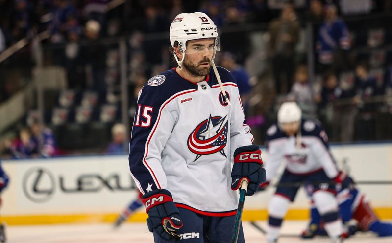 Jan 18, 2025; New York, New York, USA; Columbus Blue Jackets defenseman Dante Fabbro (15) warms up before the first period against the New York Rangers at Madison Square Garden. Mandatory Credit: Danny Wild-Imagn Images