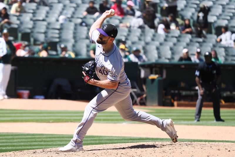 May 23, 2024; Oakland, California, USA; Colorado Rockies relief pitcher Tyler Kinley (40) pitches against the Oakland Athletics during the eighth inning at Oakland-Alameda County Coliseum. Mandatory Credit: Kelley L Cox-USA TODAY Sports