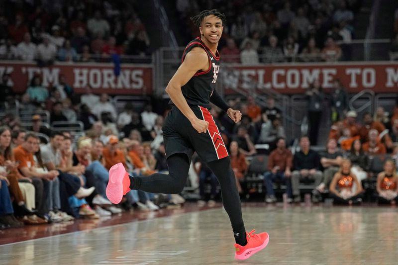 Jan 6, 2024; Austin, Texas, USA; Texas Tech Red Raiders guard Chance McMillian (0) reacts after scoring during the second half against the Texas Longhorns at Moody Center. Mandatory Credit: Scott Wachter-USA TODAY Sports