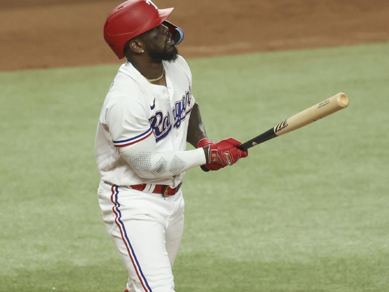 Jun 28, 2023; Arlington, Texas, USA;  Texas Rangers right fielder Adolis Garcia (53) hits a two-run home run during the sixth inning against the Detroit Tigers at Globe Life Field. Mandatory Credit: Kevin Jairaj-USA TODAY Sports